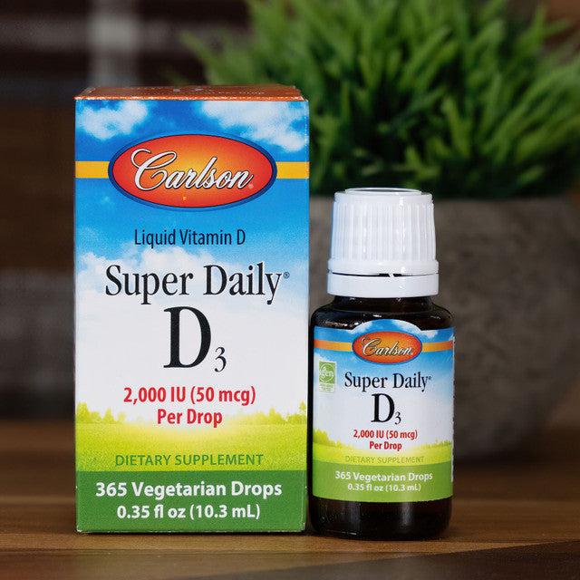 Lifestyle/use image: Carlson Vitamin D3 liquid drops daily routine supplement 10.3 ml