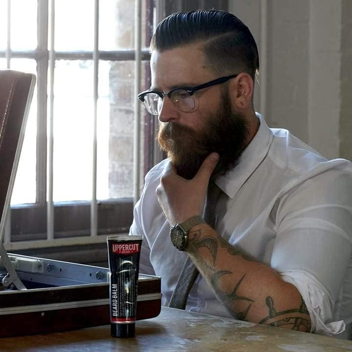 Lifestyle/use image: Uppercut Deluxe Beard Balm 100ml men beard grooming routine