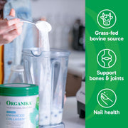 Organika collagen powder being stirred into a blender.