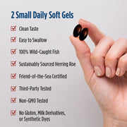 A hand holding two dark soft gel capsules next to a text list describing product benefits, including clean taste, easy to swallow, 100% wild-caught fish, sustainably sourced herring roe, and third-party testing.