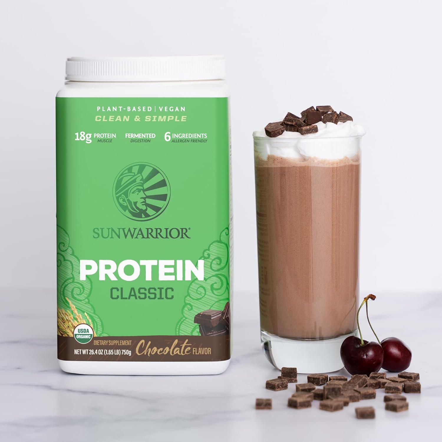 Chocolate rice protein powder being blended into a shake.