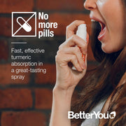 How to Use: Hand holding BetterYou Turmeric oral spray.