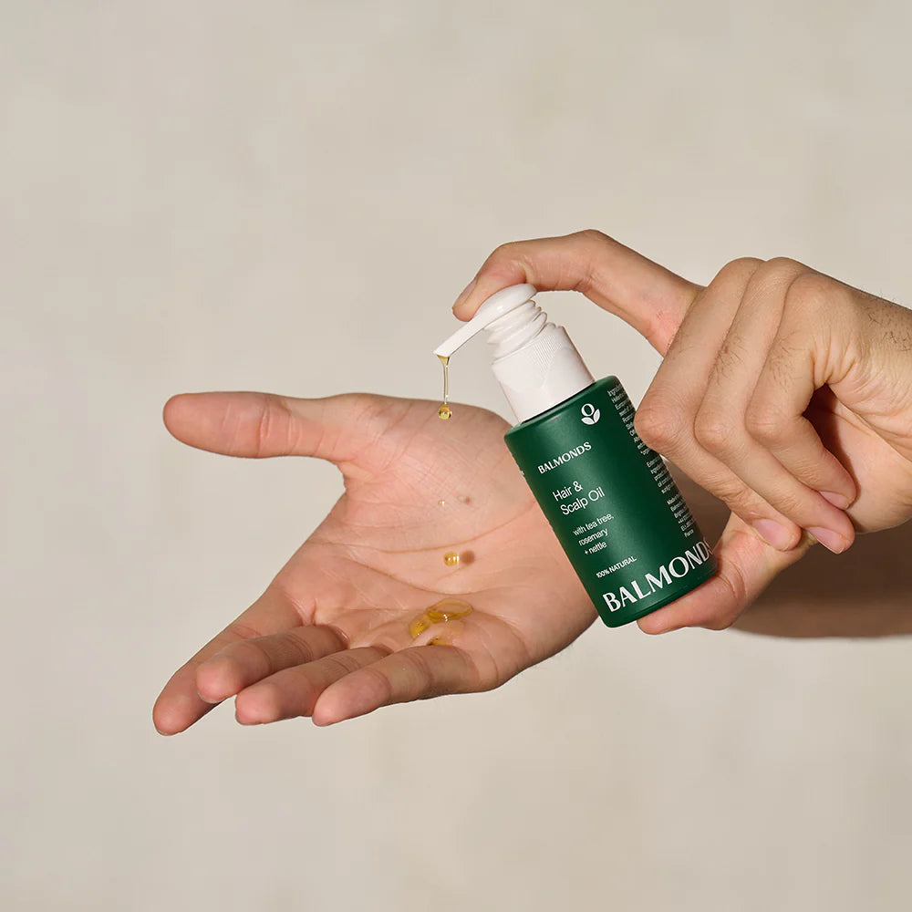 How to Use: Balmonds Hair and Scalp Oil 50ml applying oil to scalp and hair routine