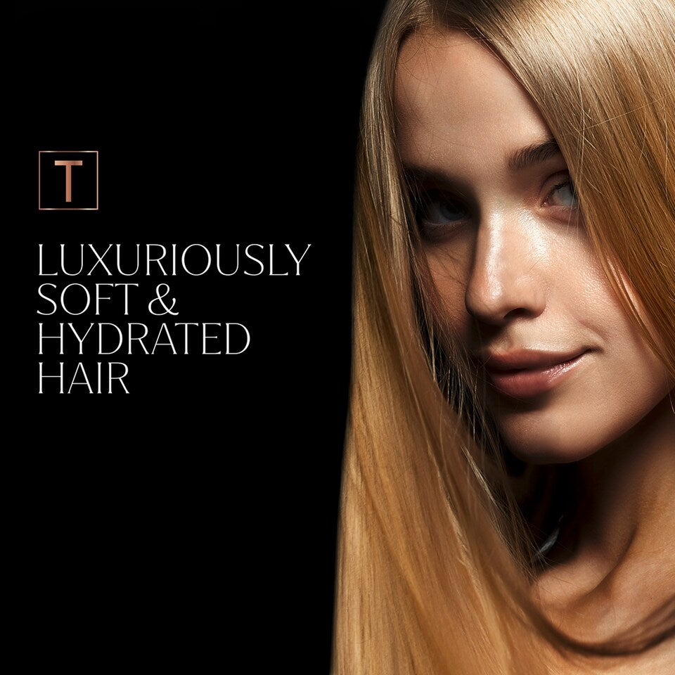 TRESemmé Rich Moisture Shampoo with Vitamin E 680ml bottle displayed alongside hair care products