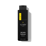Lumin Daily Defense Face Serum for Men, 15mL bottle, on white background.